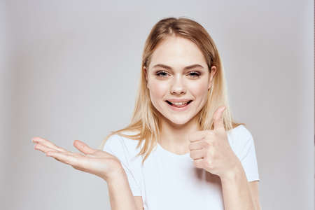 emotional blonde white t-shirt close-up studio lifestyle funの写真素材