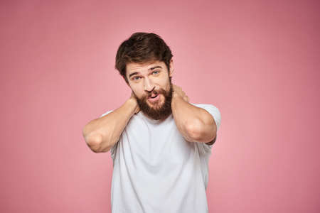 cheerful bearded man white t-shirt emotions cropped view pink background