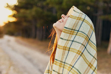 woman in plaid blanket cool nature autumn lifestyle