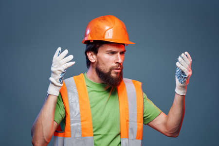 Worker man Construction uniform emotions engineer professional blue background