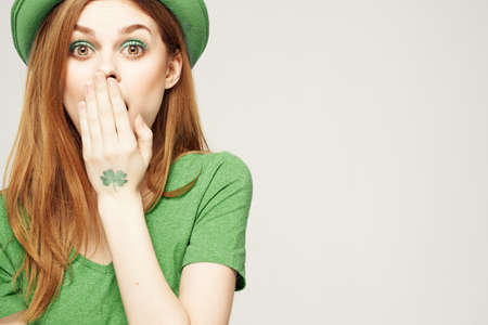 holiday Saint Patricks Day shamrock girl fun Green clothing light backgroundの写真素材
