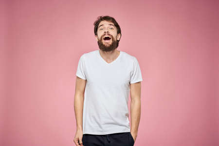 cute bearded men white t-shirt studio pink isolated backgroundの写真素材