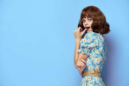 Pretty woman emotional look open mouth stylish clothes