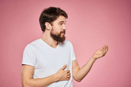 cheerful bearded man white t-shirt emotions cropped view pink background