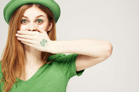 holiday Saint Patricks Day shamrock girl fun Green clothing light backgroundの写真素材