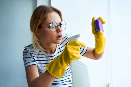 Woman cleans the room interior rendering services detergent work lifestyleの写真素材