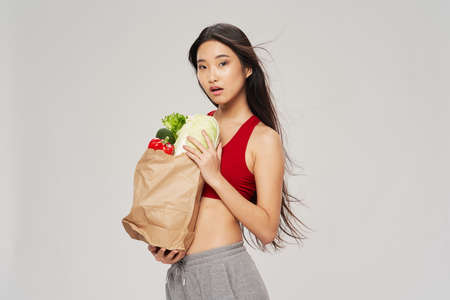 woman with food package slim figure vegetarianの写真素材