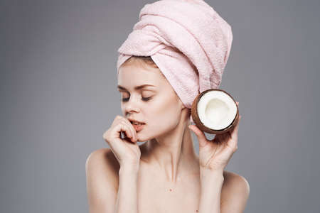 Pretty woman spa treatments exotic clean skin gray backgroundの写真素材