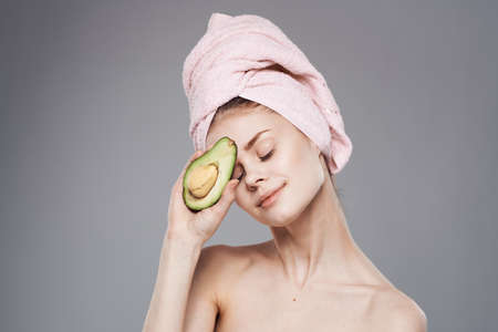 Attractive woman with pink towel on head exotic freshness cropped view