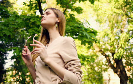 cheerful woman nature rest green grass fun