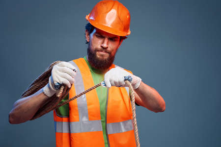 A man in a working uniform construction security professionals