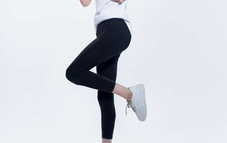 Woman in White T-shirt and Sport Fitness Copy Space leggingsの写真素材