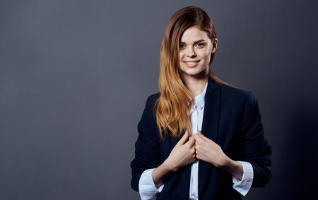 Business woman in suit holds hands in front of her Professional office manager