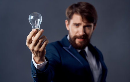 Man hand success ideas brain gray background cropped view