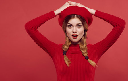 pretty woman with pigtails red dress attractive look isolated backgroundの写真素材