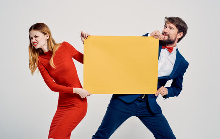 man takes the mockup from the womans hands advertising emotion funの写真素材