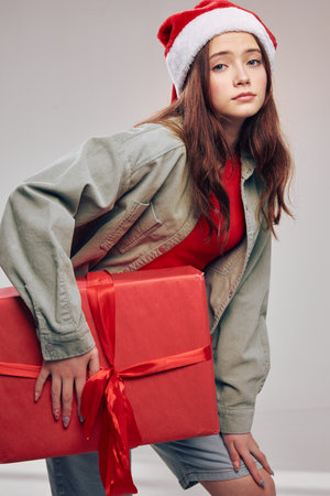 new year holidays gifts beautiful little girl in a hat christmas santa claus