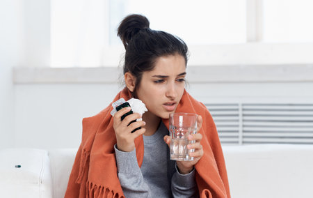 Allergic reaction young woman with napkin in hand model headache