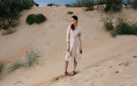 woman outdoors desert sand landscape walk travelの写真素材