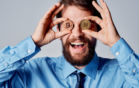 Business man cryptocurrency Bitcoin near face emotions finance technologyの写真素材