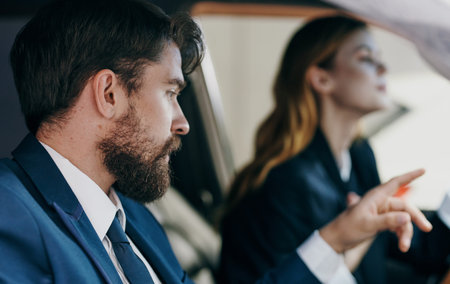 Colleagues at work in the car salon emotions trip officialsの写真素材