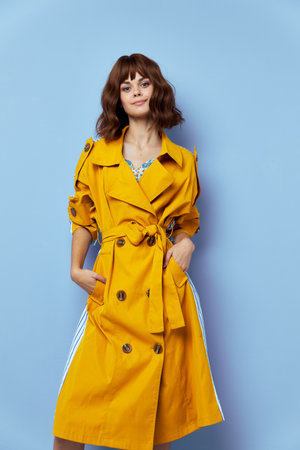Fashion woman look ahead smile hands in pockets stylish clothesの写真素材
