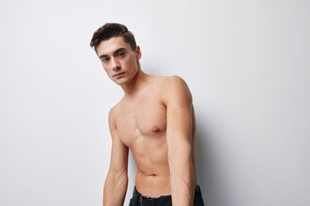 Sexy topless couple bent over to the sideの写真素材