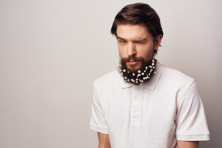 Bearded man white shirt emotions barbershop light backgroundの写真素材