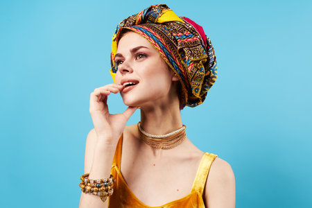 pretty woman decoration ethnicity multicolored turban on head close-up