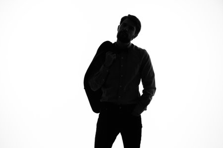man in a suit detective crime light background shadow incognitoの写真素材