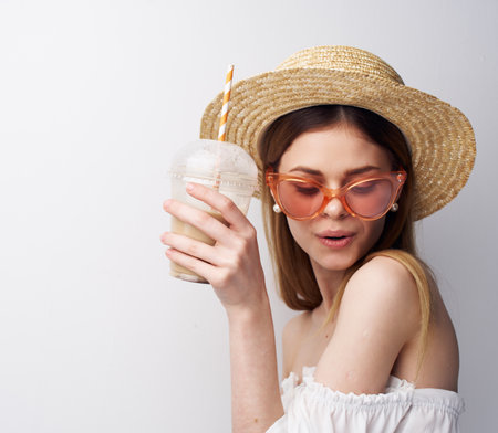 pretty woman fashion glasses studio glass with drink modelの写真素材