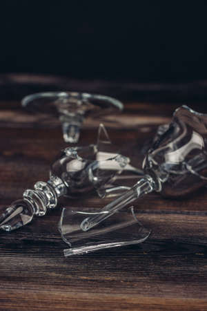 broken glass on the table kitchen appliances wooden tableの写真素材