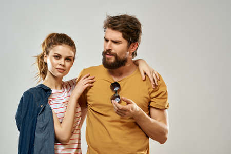 Young couple lifestyle emotions communication fashion light background