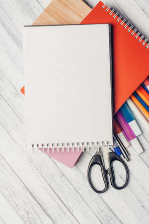 pencils for drawing notepad scissors office wooden tableの写真素材
