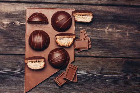 Marshmallow on chocolate sweets delicacy cocoa wooden tableの写真素材