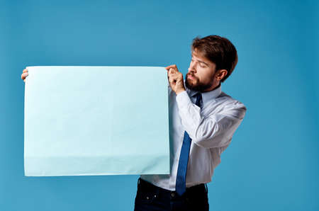 business man in shirt with tie holding advertising marketingの写真素材
