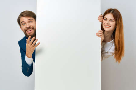 funny business man and woman white poster presentation copy spaceの写真素材