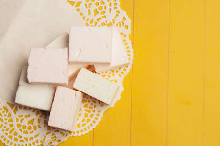 marmalade candy chocolate sweets yellow wooden background dessertの写真素材