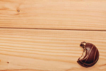 cake and chocolate bar wooden background image textureの写真素材