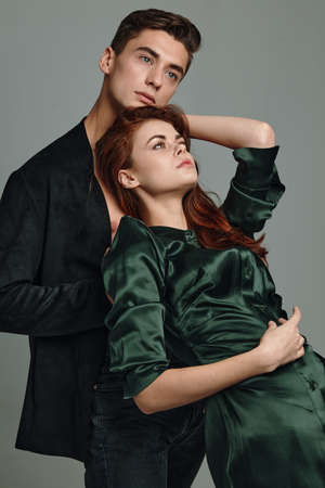 Young cute couple luxury embrace romance studioの写真素材