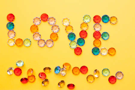 colorful diamonds love holiday Valentine yellow backgroundの写真素材