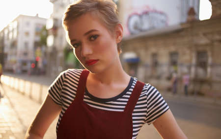 pretty short haired woman outdoors walking fresh air