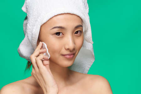 Asian Woman Bare Shoulders Clear Skin Makeup Removalの写真素材