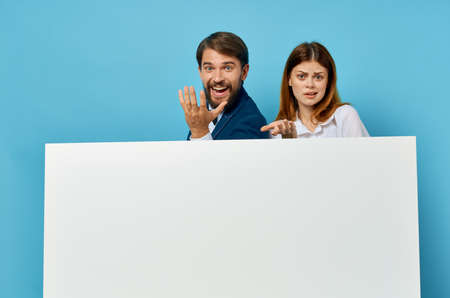 cheerful young couple officials presentation white paper copy space advertisingの写真素材