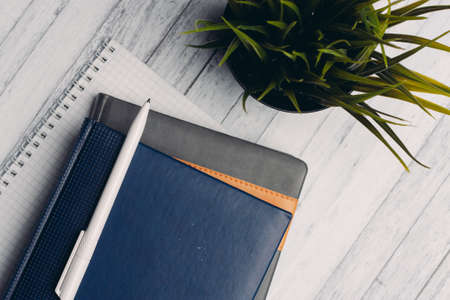 notepads documents desktop office close-up pen objects from aboveの写真素材