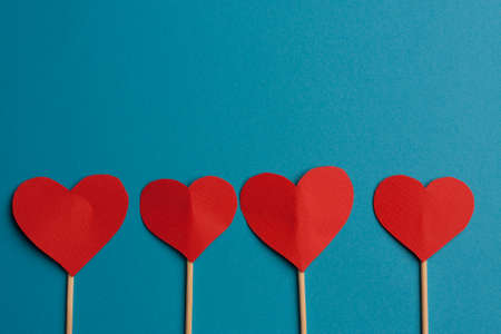 heart on stick gift love holiday valentines day blue backgroundの写真素材