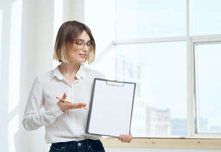 room finance woman business documents interior window