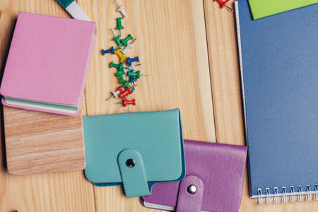 business card holders notepads stationery on the desktop top viewの写真素材