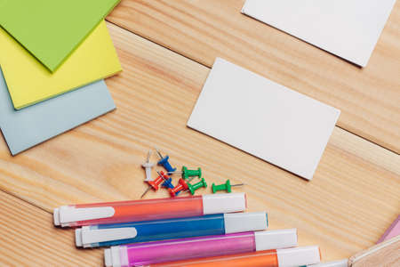 business cards colorful pencils work desk stationery top view