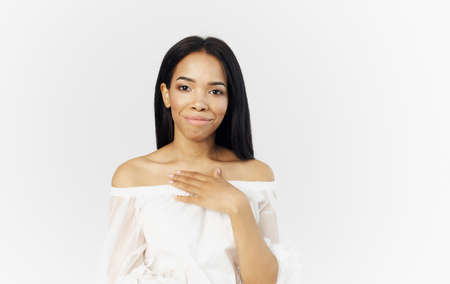 Pretty African woman appearance white dress attractive appearance light background